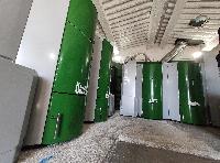 Instalación de sala de calderas okofen con una cascada de 6 pellematic que arrancan secuencialmente según demanda energética